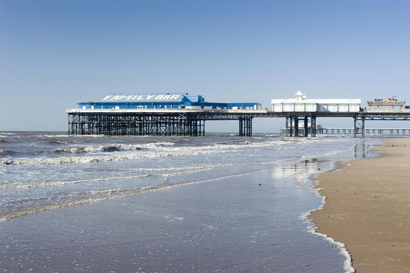 the end portion of blackpools central pier with north pier behind