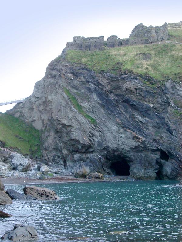 a view across the bay to the castle ruins at tintagel