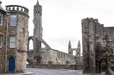 Graceful spires and ruins of St Andrews Cathedral from the street with the rondel building in the foreground, the historic Scottish town of St Andrews