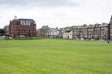 View across the golf course of St Andrews, Scotland with its historic architecture and rows of town houses in a travel and sport concept