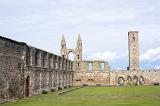 St Andrews Cathedral ruins, St Andrews, Scotland showing the remnants of the historic stone walls and Gothic spires under a cloudy grey sky