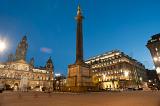george square, glasgow at night including the walter scott monument and council chambers in the background