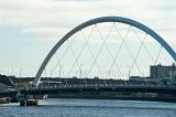 The Clyde Arc in Glagsow, Scotland, a modern road bridge spanning the River Clyde with a steel arc above the span