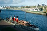 View of the Waverley Paddle Steamer moored at a dock , the last seagoing passenger steamer in the world she does cruises from Glasgow and towns in the Forth of Firth