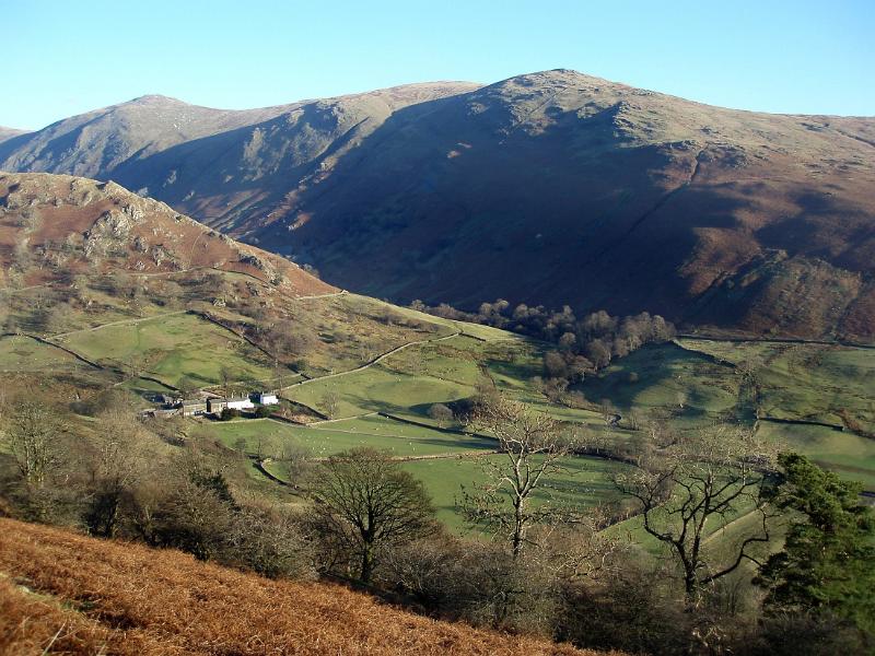 a view of ill bell from kirkstone pass with a clear blue sky