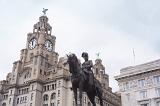 Low angle view on statue of Edward the VII near Liver Building in downtown Liverpool, United KIngdom