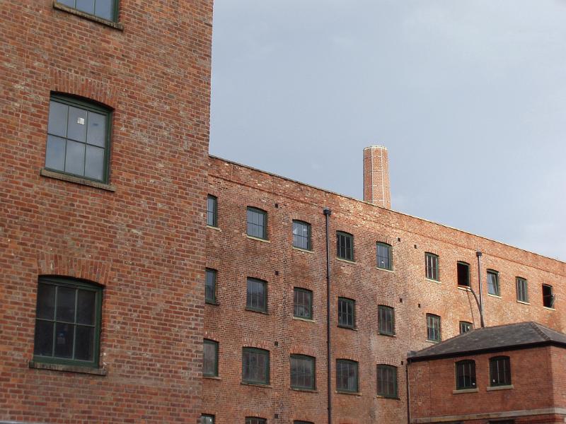 industrial eara in central manchester brick frontage of warehouse buildings