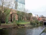 Manchester canal towpath in the Castlefield conservation area in innercity Manchester preserving the first industrial canal and warehouses