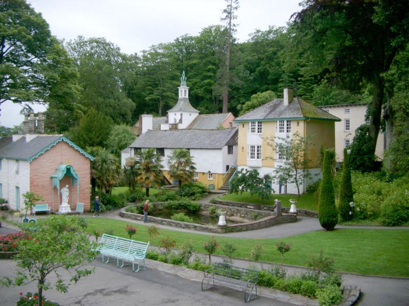 Quaint Buildings and Pond with Green Space in Portmeirion, a Popular Tourist Village in Gwynedd, North Wales