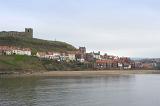 st marys church on top of the east cliff and below the houses on tate hill and tate sands, whitby lower harbour