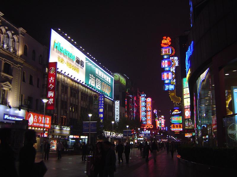 Attractive City Neon Lights From Various Commercial Buildings at Night Time in China.