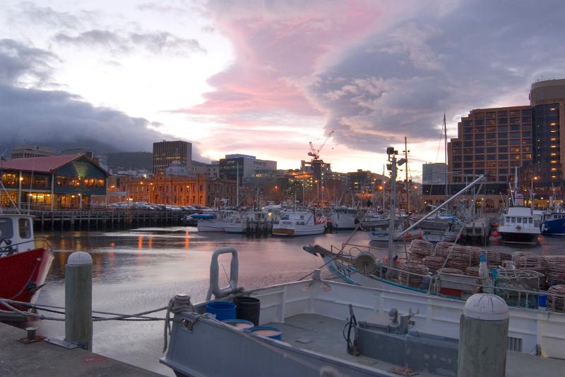 boats moored at constitution dock hobart pictured  at sunset