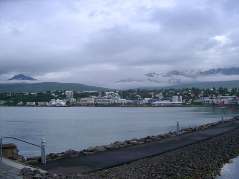 View of Akureyri from Across Eyjafjorour Fjord on Cloudy Grey Day, Iceland