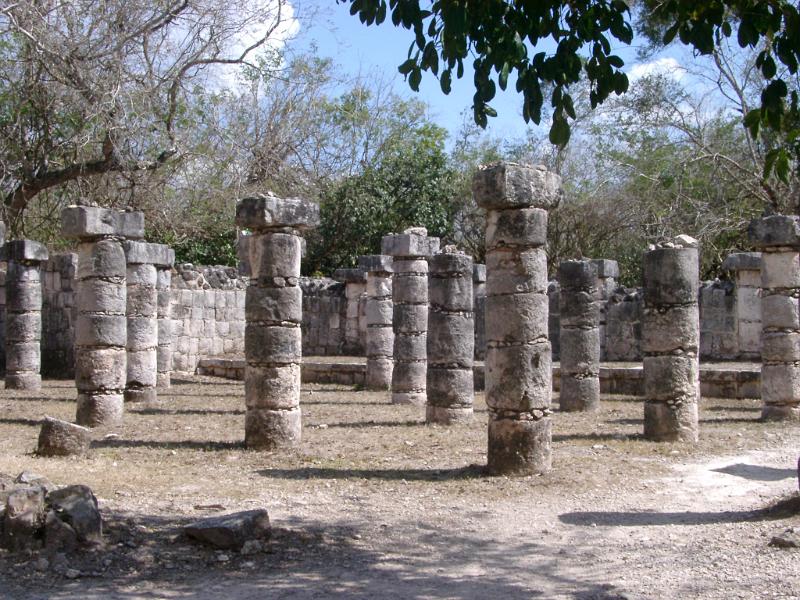 Ancient stone coloumns, remnants of a building in Chitzen Itza Mayan ruins, Yucatan Province, Mexico