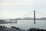 Famous Long Golden Gate Bridge in San Francisco. Against a Very Light Blue White Sky Background.