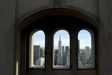 View through the arched Coit Tower windows of the CBD in San Francisco, California