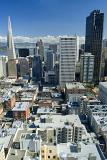 Assorted Building Structures at Downtown San Francisco on Lighter Blue Sky Background.