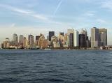Manhattan, New York, USA, skyline with its modern skyscrapers viewed across the water from the ferry