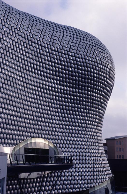 Exterior facade of the Bullring Shopping Centre with its modern curved architectural design and entrance, Birmingham, UK