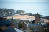 a telephoto view looking down over the rooftops of st ives, cornwall