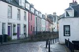 small terraced houses and coble stone streets in queensferry, scotland