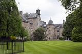Grounds of St Andrews University, Scotland looking across manicured green lawns to historic stone buildings