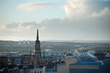 Glasgow skyline with a view across the rooftops of the city on a cloudy day