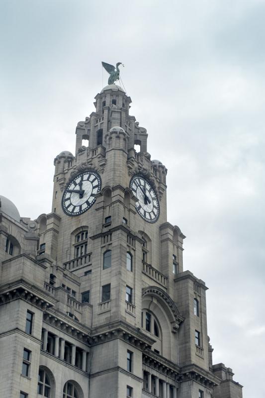 Low angle view of the Liver Building Low angle view of the Liver Building under cloudy sky in Liverpool, United Kingdom