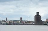 Skyline view of the Birkenhead Mersey Waterfront buildings under cloudy skies with copy space