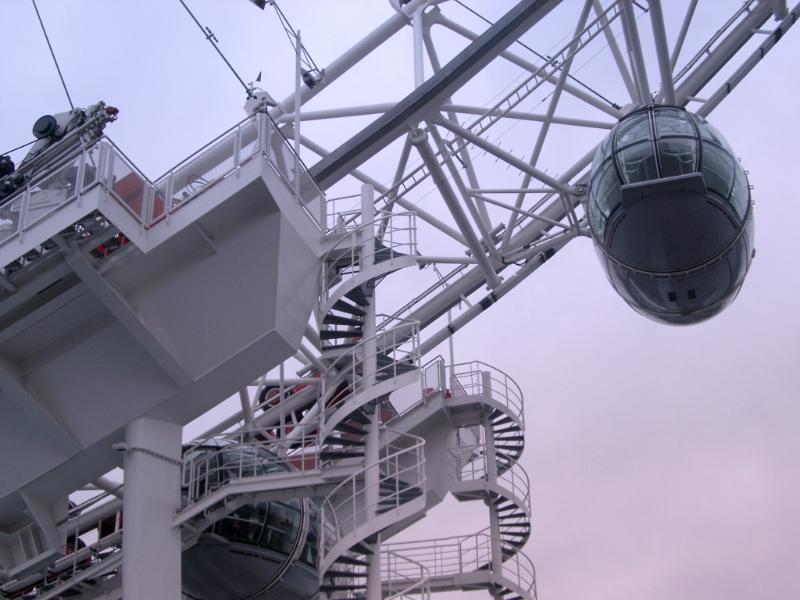 Detail of the London Eye ferris wheel, London showing the boarding platform and ovoid passenger capsule for viewing the topography of the city