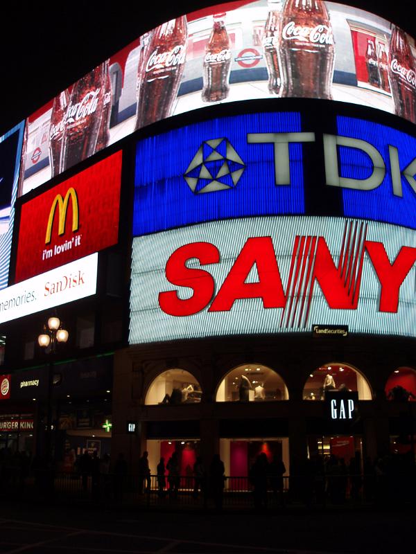 Colorful neon lights and advertising signs at Piccadilly Circus, London illuminated at night