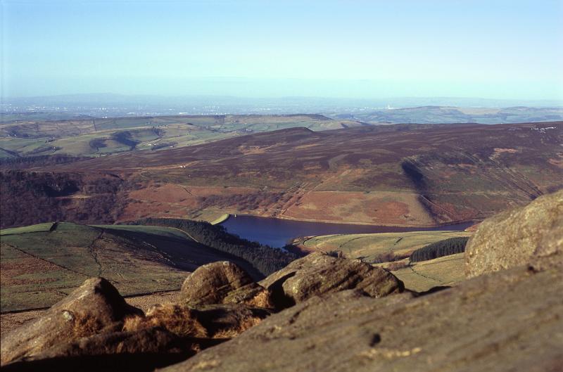 View from Kinder Scout of a water resevoir in the hills of the Derbyshire Peak District, UK