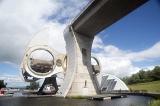 Uniquely shaped Falkirk wheel in Scotland as seen from a low angle view on a clear summer day