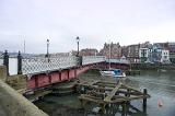the whitby swing bridge open to accommodate the passage of a sailing yacht