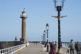 view down the stone west pier to the Whitby West Breakwater Light