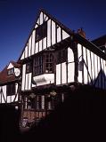 Traditional timber framed Tudor house with an overhanging bay window in York, UK
