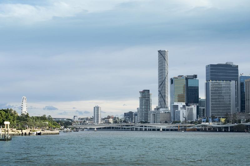 The city CBD and tall skyscrapers on the banks of the Brisbane river in Australia.