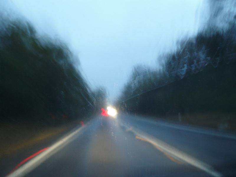 Australia is a country of long road journeys - blurry In Motion Long Distance Road at Night Time While Driving.