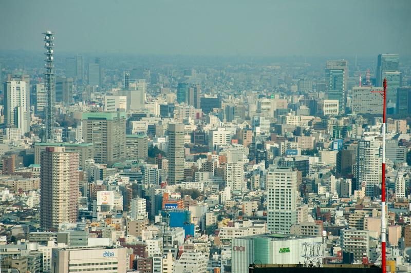 urban sprawl - an elevated view of buildings of metropolitan tokyo, japan