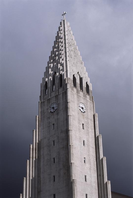 Steeple of Hallgrim Lutheran Cathedral, with unusual impressive architecture, in Reykjavik, Iceland