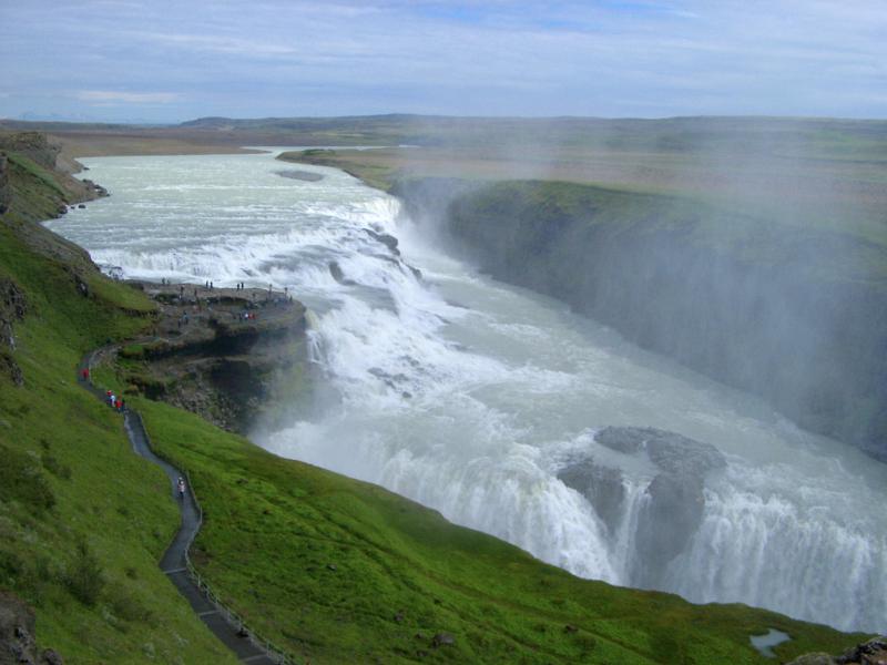 Scenic landscape view of the powerful flow of water and mist at Gullfoss waterfall, Iceland, in the Hvita River, which is a popular tourist attraction