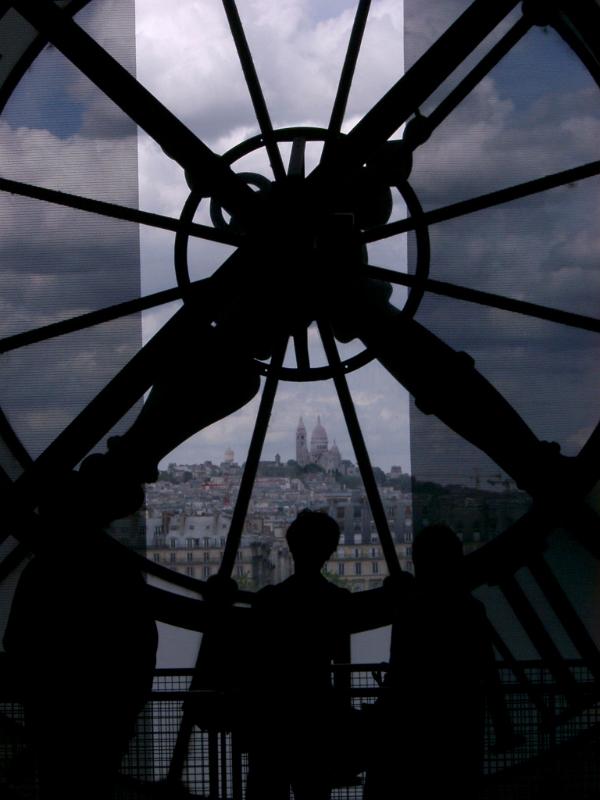 Silhouette of Person Admiring the View of Basilique du Sacre Coeur from Inside Musee d Orsay Clock Tower