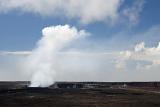 Smoke at Kilauea Caldera in Hawaii. An Active Volcano in Hawaiian Islands. Isolated Blue and White Clouds.