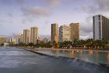 Sunrise over Waikiki Beach and the skyscrapers and modern architecture of the waterfront in Honolulu