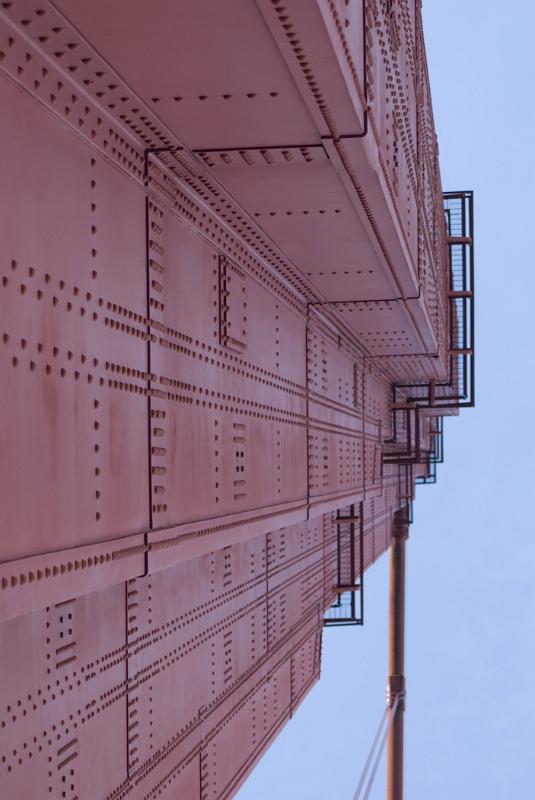 Detailed Metallic Design of Golden Gate Bridge San Francisco Isolated on Sky Blue Background.