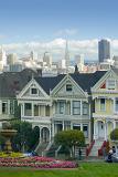 View of the Painted Ladies, a row of iconic landmark historical townhouses in Alamo Square, San Francisco, California, USA