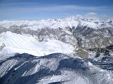 Extensive View of Huge French Mountains Filled with Snow in the Winter Holiday Season